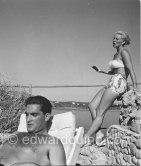 Ginger Rogers and her husband, lawyer Christian Bergerac, at Monte Carlo Beach 1952. - Photo by Edward Quinn