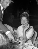 Elizabeth Taylor after the screening of "Around the World in 80 Days" at the Cannes Film Festival in 1957. She was among more than a thousand guests invited by her husband Mike Todd to a gala supper at Les Ambassadeurs to celebrate the film. At this time she was widely considered to be one of the most beautiful women in the world. - Photo by Edward Quinn