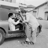 Peter Ustinov in sporting outfit at the film Studios of Nice where he worked for the English version of "Lola Montès". And his wife Suzanne Cloutier. Studios de la Victorine, Nice 1955. Car: 1955 Aston Martin DB 2/4 Drophead coupé - Photo by Edward Quinn