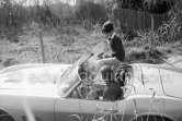 Roger Vadim and Catherine Deneuve, rarely seen with dark hair. Saint-Tropez 1961. Car: 1961 Ferrari 250 GT SWB Spyder California serial number 2175GT - Photo by Edward Quinn