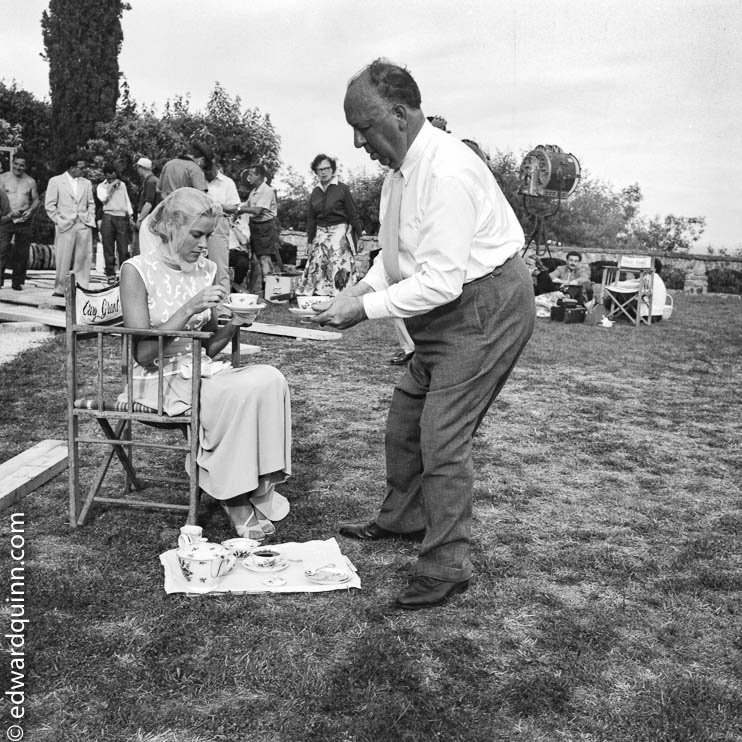 Grace Kelly and Alfred Hitchcock take afternoon tea on the set of "To Catch A Thief". Cannes 1954.