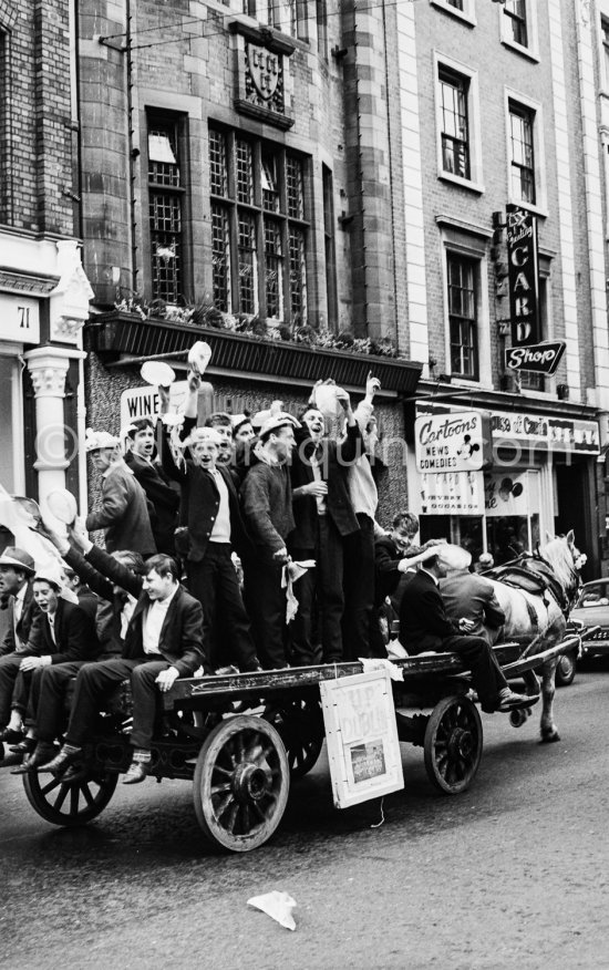 UP DUBLIN. St. Patrick’s Day Parade. Grafton Street. In front of the Cartoon Cinema, Grafton St (opened on the 11th of April 1911). Dublin 1963. - Photo by Edward Quinn