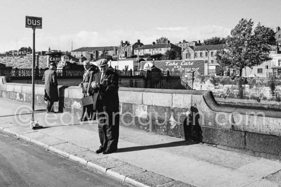 Bus stop, John Heuston Bridge. Dublin 1963. - Photo by Edward Quinn