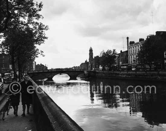 The River Liffey near Arran Quay. Father Mathew Bridge, St Paul\'s Church on the other side. Dublin 1963. - Photo by Edward Quinn