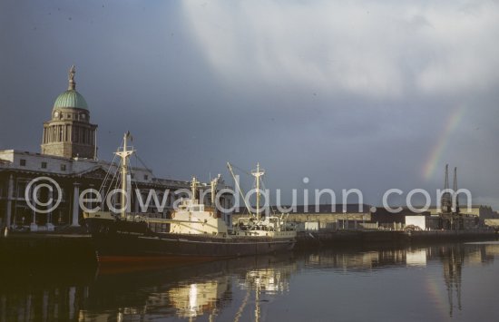 The River Liffey with Custom House and the Guinness Brewery ship The Lady Grania loading barrels. Dublin 1963. - Photo by Edward Quinn