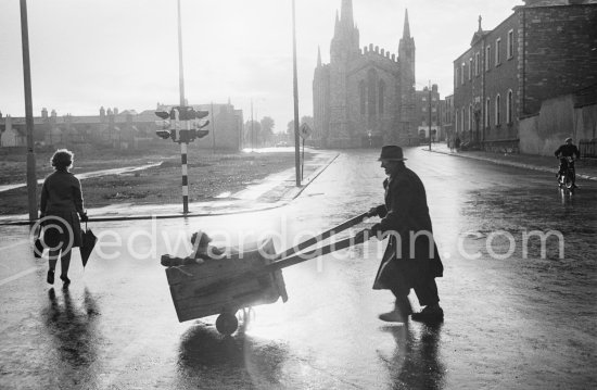 The intersection of Granby Row and Dorset Street with the Black Church in the background. Dublin 1963. Published in Quinn, Edward. James Joyces Dublin. Secker & Warburg, London 1974. - Photo by Edward Quinn