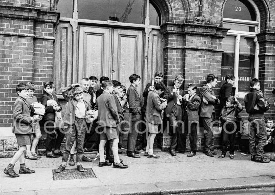 Boys in front of the old Tara Street wash house. Dublin 1963. - Photo by Edward Quinn