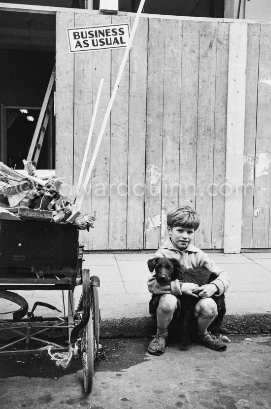 Business as usual. Boy with his dog. Dublin 1963. - Photo by Edward Quinn