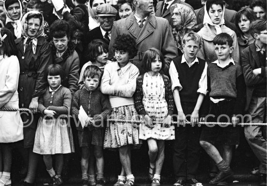 Waiting for President Kennedy to drive past during his visit. Dublin 1963. - Photo by Edward Quinn