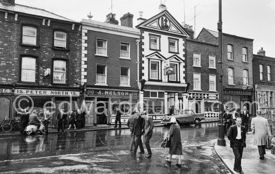 Peter North Bar and Shelbourne Bar. Thorncastle St. / Bridge St., Ringsend Village. Dublin 1963. - Photo by Edward Quinn