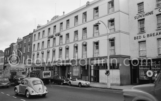 Ormond Hotel, Upper Ormond Quay. Featured "the Sirens" chapter in James Joyce’s Ulysees. Dublin 1963. Cars: Volkswagen Beetle, MG A, Ford Anglia - Photo by Edward Quinn