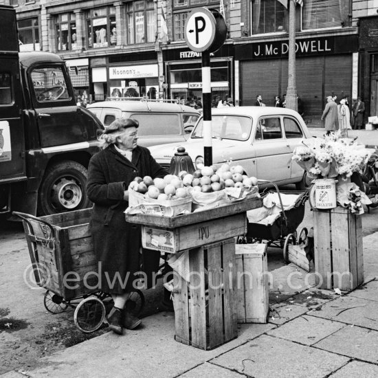 Farmer\'s market stall and J. Mc Dowell jewellery.  O\'Connell Street Upper. Dublin 1963. - Photo by Edward Quinn