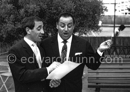 Charles Aznavour and singer Dario Moreno. Cannes 1960. - Photo by Edward Quinn