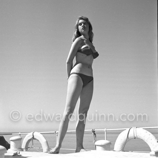 Brigitte Bardot during filming of Manina, la fille sans voiles on the  yacht Suraya. Villefranche harbor 1952.