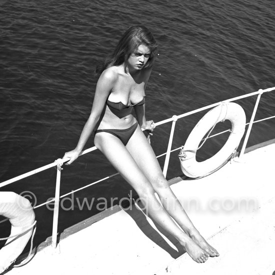 Brigitte Bardot during filming of "Manina, la fille sans voiles" on the yacht Suraya. Villefranche harbor 1952. - Photo by Edward Quinn