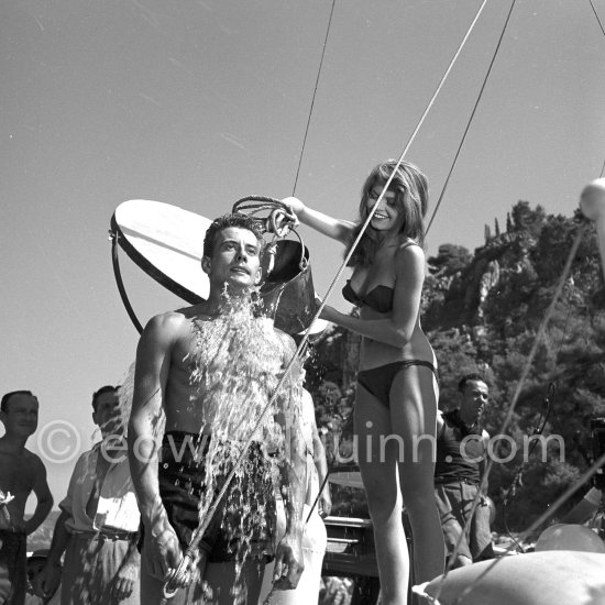 Brigitte Bardot and Jean-François Calvé during filming of "Manina, la fille sans voiles" on the yacht Suraya. Villefranche harbor 1952. - Photo by Edward Quinn