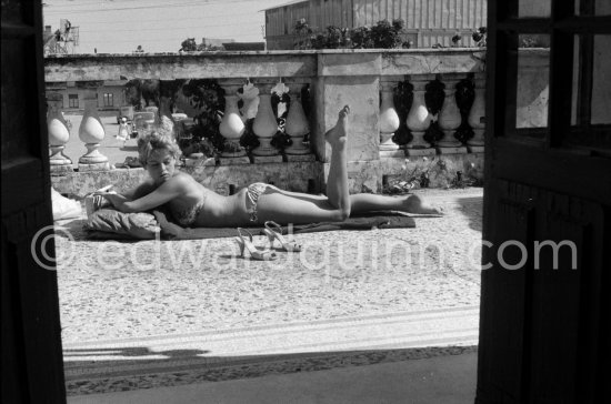 Brigitte Bardot relaxing. Studios de la Victorine, Nice 1956. - Photo by Edward Quinn