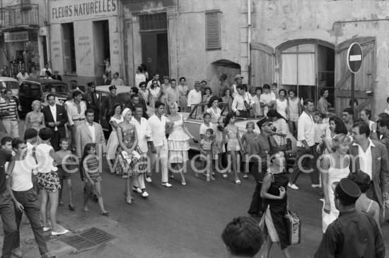 Brigitte Bardot with Sacha Distel at the wedding of Jazz musician "Moustache". Saint-Tropez 1958. - Photo by Edward Quinn