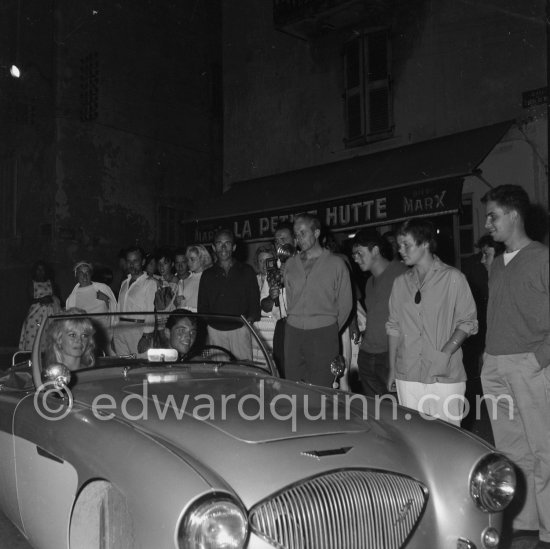 Brigitte Bardot and Sacha Distel. Car: Austin-Healey 100/4 1953-55. Saint-Tropez 1958. - Photo by Edward Quinn