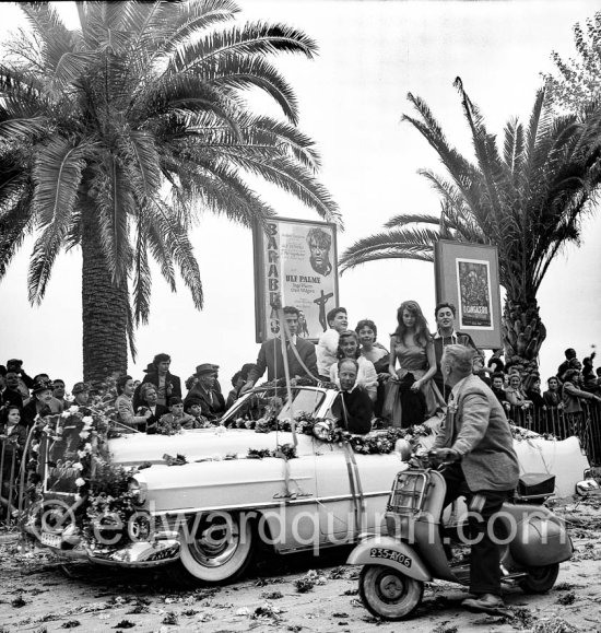 Brigitte Bardot making her first appearance at the Cannes Film Festival in 1953 to promote the film "Manina, la fille sans voiles" or The Girl in the Bikini. Car: 1953 Cadillac Eldorado Convertible - Photo by Edward Quinn