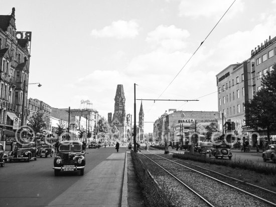 Kurfürstendamm, Gedächtniskirche, Berlin 1952. Car: Ford Taunus "Buckeltaunus" 1939-1941 - Photo by Edward Quinn