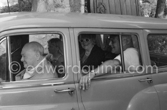 Sir Winston Churchill, Lady Clementine, Randolph Churchill, his son and whose daughter Arabella. Golden wedding anniversary (11.9.58) of Churchill, Cap d\'Ail 1958. Car: Humber Hawk Mark VI Estate1956. - Photo by Edward Quinn