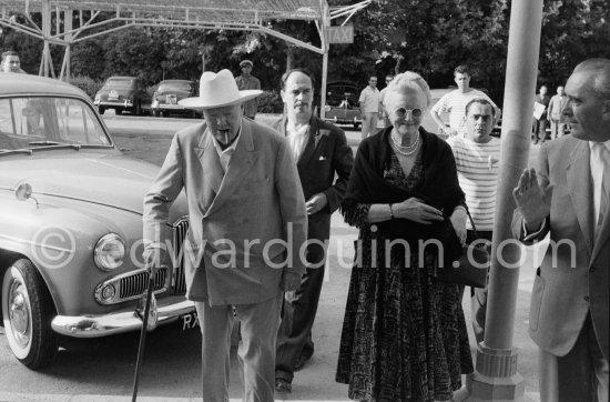 Sir Winston Churchill, Lady Clementine; Edmond Murray, Churchill’s Scotland Yard bodyguard. Golden wedding anniversary (11.9.58) of Churchill, Nice Airport 1958. Car: Humber Hawk Mark VI Estate 1956. - Photo by Edward Quinn