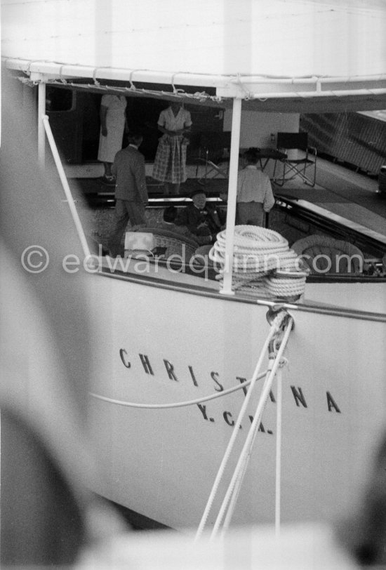 Aristotle Onassis and Sir Winston Churchill. On board Christina, Churchill sitting in lowerable swimming pool. Monaco harbor, about 1957. - Photo by Edward Quinn