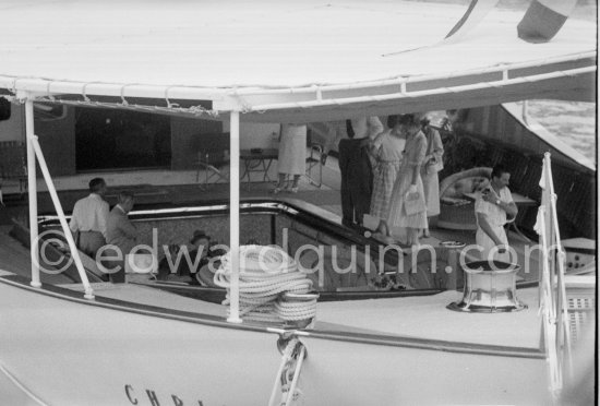 Aristotle Onassis and Sir Winston Churchill. On board Christina, Churchill sitting in lowerable swimming pool. Monaco harbor, about 1957. - Photo by Edward Quinn