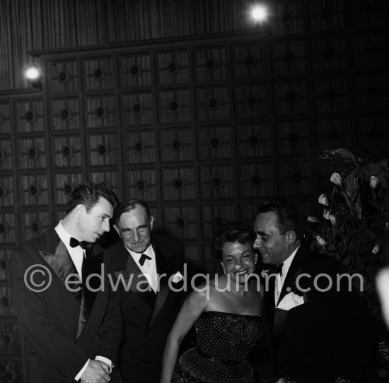 Yves Montand, Charles Vanel, Vera Clouzot, Henri-Georges Clouzot (from left) at the Cannes Film Festival for a screening of "Le salaire de la peur". Cannes April 16, 1953. - Photo by Edward Quinn