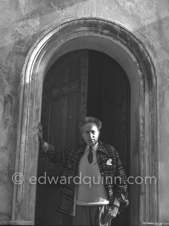 Jean Cocteau in front of the Chapelle Saint Pierre. Villefranche-sur-Mer 1956. - Photo by Edward Quinn