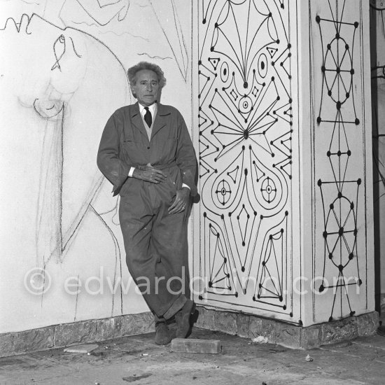 Jean Cocteau working on the mural of the Chapelle Saint Pierre. Villefranche-sur-Mer 1956. - Photo by Edward Quinn