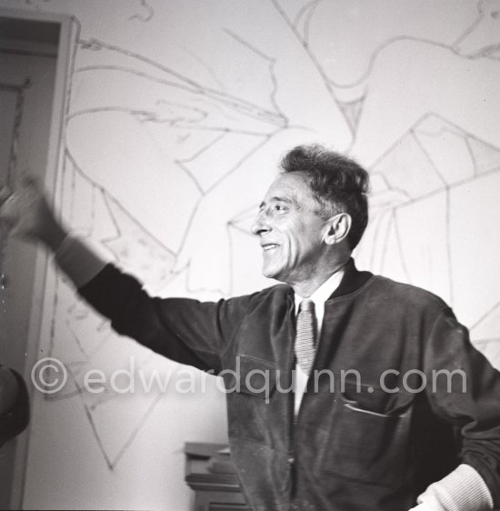 Jean Cocteau at Villa Santo Sospir of his close friend Francine Weisweiller in front of one of the murals he made for the interior walls. Saint-Jean-Cap-Ferrat 1954. - Photo by Edward Quinn