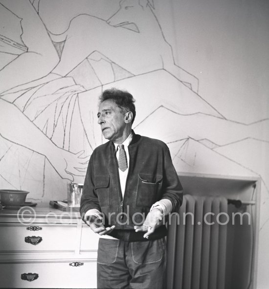 Jean Cocteau at Villa Santo Sospir of his close friend Francine Weisweiller in front of one of the murals he made for the interior walls. Saint-Jean-Cap-Ferrat 1954. - Photo by Edward Quinn