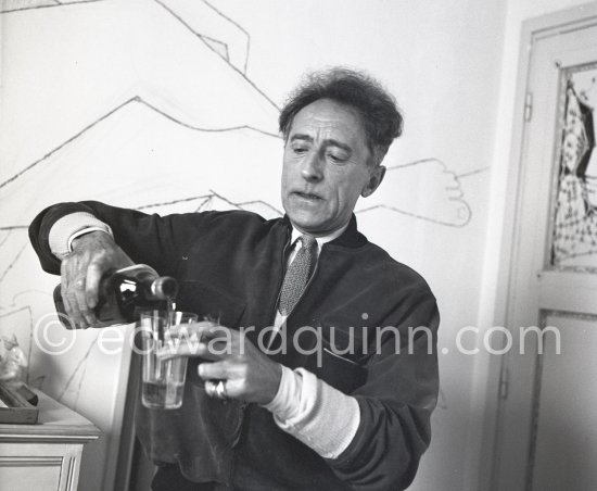 Jean Cocteau at Villa Santo Sospir of his close friend Francine Weisweiller in front of one of the murals he made for the interior walls. Saint-Jean-Cap-Ferrat 1954. - Photo by Edward Quinn