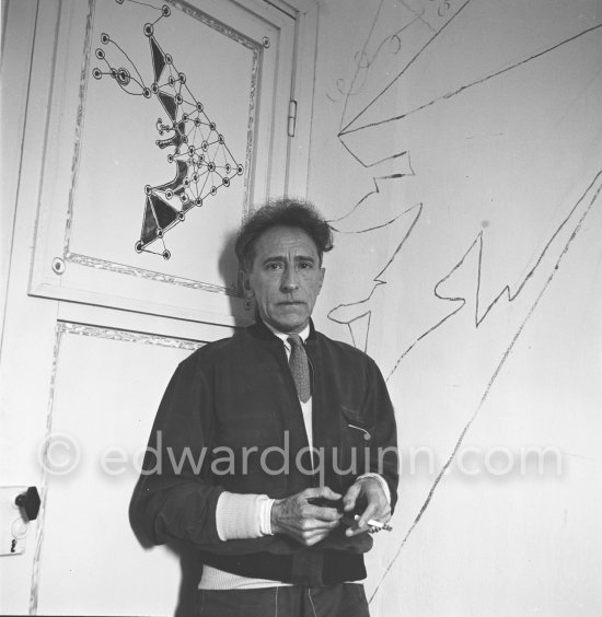 Jean Cocteau at Villa Santo Sospir of his close friend Francine Weisweiller in front of one of the murals he made for the interior walls. Saint-Jean-Cap-Ferrat 1954. - Photo by Edward Quinn