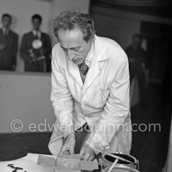 Jean Cocteau, making a drawing for the 6th Cannes Film Festival. Cannes 1953. - Photo by Edward Quinn