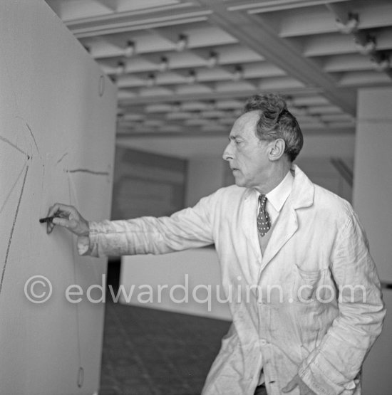 Jean Cocteau, making a drawing for the 6th Cannes Film Festival. Cannes 1953. - Photo by Edward Quinn