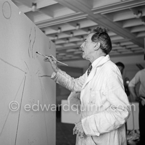 Jean Cocteau, making a drawing for the 6th Cannes Film Festival. Cannes 1953. - Photo by Edward Quinn