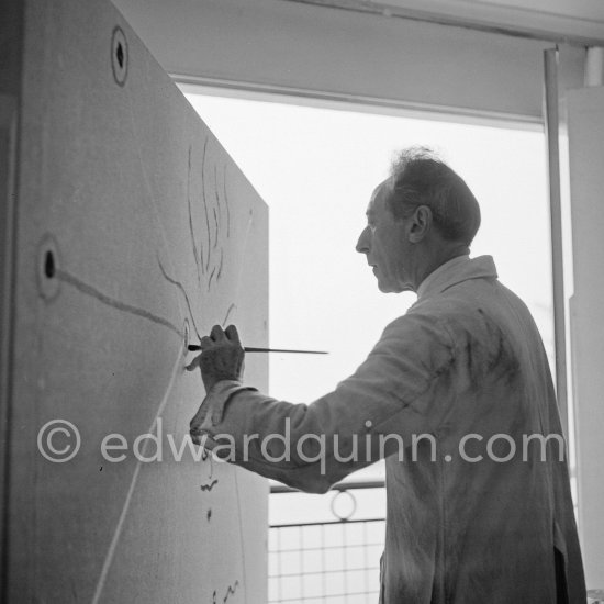 Jean Cocteau, making a drawing for the 6th Cannes Film Festival. Cannes 1953. - Photo by Edward Quinn