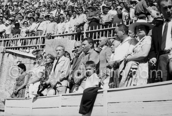 Jean Cocteau, Francine Weisweiller and her daughter Carole, Yul Brynner behind them. At a bullfight. Arles 1960. - Photo by Edward Quinn