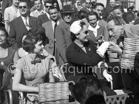 Jean Cocteau, the Begum and Françoise Arnoul. Cannes Film Festival, battle of flowers 1954. - Photo by Edward Quinn