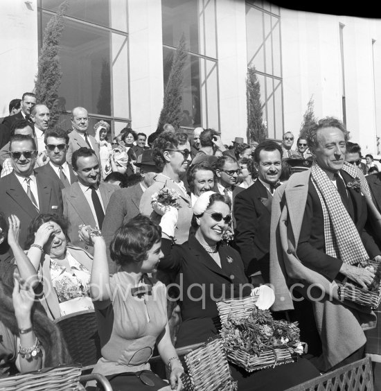 Jean Cocteau, the Begum and Françoise Arnoul. Cannes Film Festival, battle of flowers 1954. - Photo by Edward Quinn