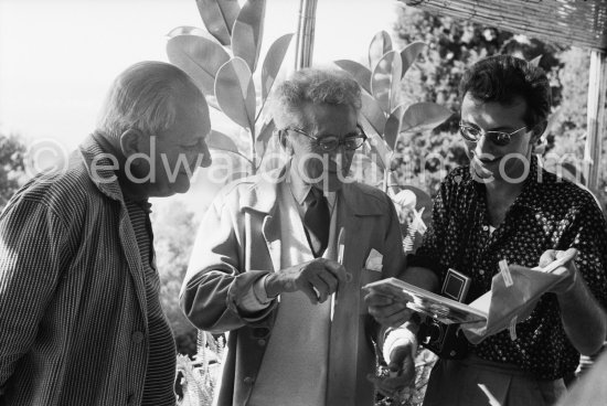 Alberto Magnelli, Cocteau, photographer Lucien Clergue. During filming of "Le Testament d’Orphée", film of Jean Cocteau. Saint-Jean-Cap-Ferrat 1959. - Photo by Edward Quinn