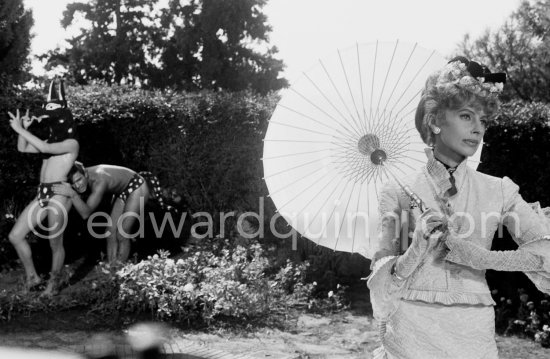 Francine Weisweiller and "L\'homme chien" (Guy Dute and Jean-Claude Petit). During filming of "Le Testament d’Orphée", film of Jean Cocteau. Saint-Jean-Cap-Ferrat 1959. - Photo by Edward Quinn