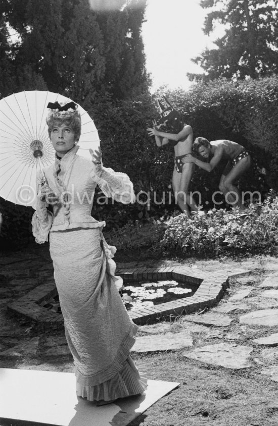 Francine Weisweiller and "L'homme chien" (Guy Dute and Jean-Claude Petit). During filming of "Le Testament d’Orphée", film of Jean Cocteau. Saint-Jean-Cap-Ferrat 1959. - Photo by Edward Quinn