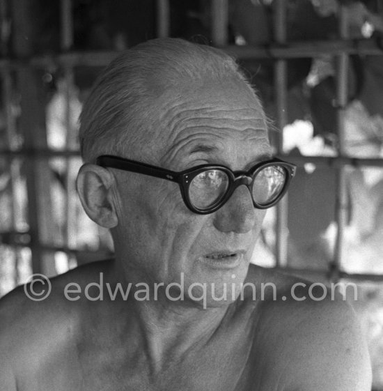 Le Corbusier (Charles-Édouard Jeanneret) at the small restaurant L'Etoile de Mer next to his vacation cabin Le Cabanon. Roquebrune-Cap-Martin 1953. - Photo by Edward Quinn