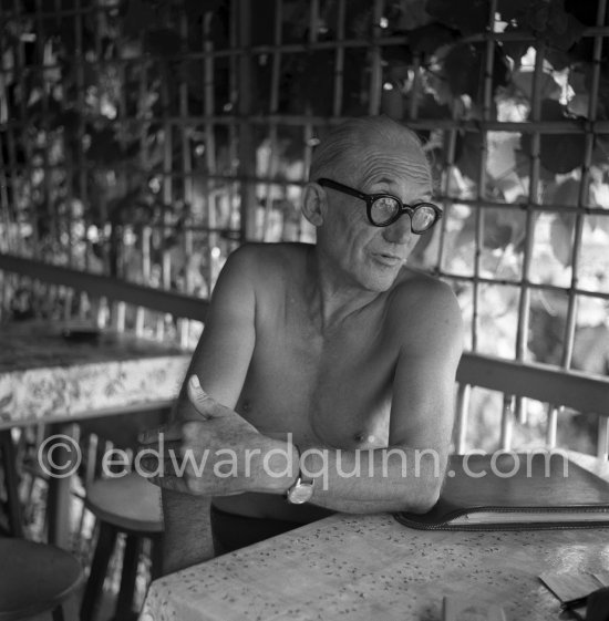 Le Corbusier (Charles-Édouard Jeanneret) at the small restaurant L'Etoile de Mer next to his vacation cabin Le Cabanon. Roquebrune-Cap-Martin 1953. - Photo by Edward Quinn