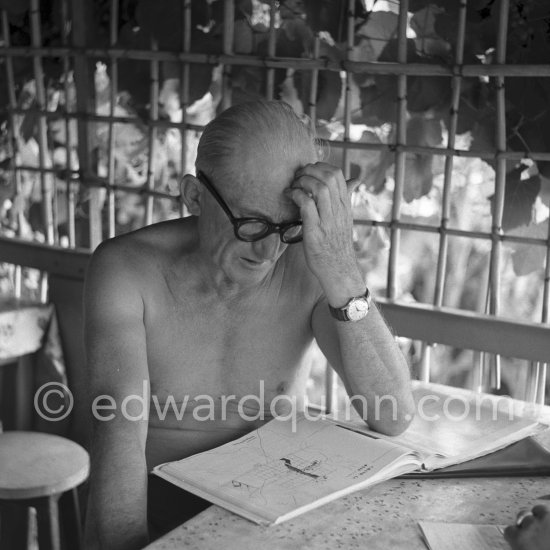 Le Corbusier (Charles-Édouard Jeanneret) at the small restaurant L'Etoile de Mer next to his vacation cabin Le Cabanon. Roquebrune-Cap-Martin 1953. - Photo by Edward Quinn