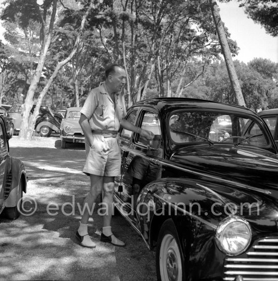 Noel Coward, Eden Roc, Saint-Jean-Cap-Ferrat 1952. Car: Peugeot 203. - Photo by Edward Quinn